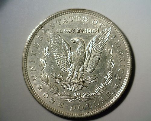 1885     SILVER  MORGAN  DOLLAR  ABOUT UNCIRCULATED   NICE LOOKING COIN!!!