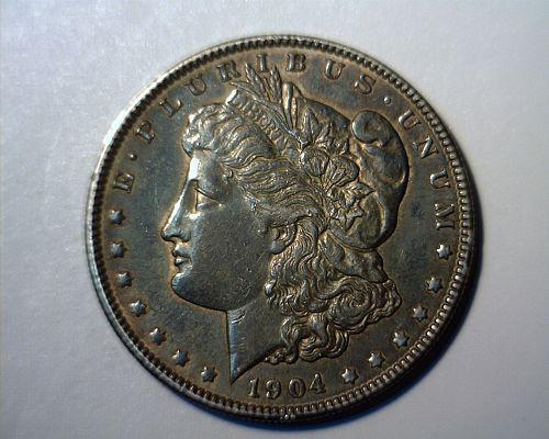 1904   SILVER  MORGAN  DOLLAR  CIRCULATED   NICE LOOKING COIN!!!