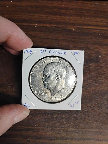 1974 EISENHOWER DOLLAR AU STRUCK THROUGH GREASE OBVERSE & REVERSE ERROR COIN