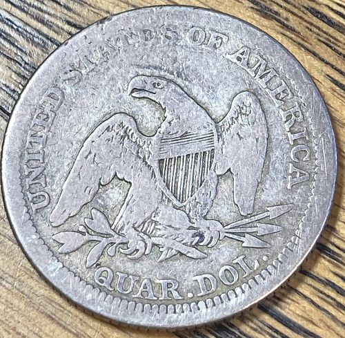 1858 seated liberty quarter in VERY GOOD condition