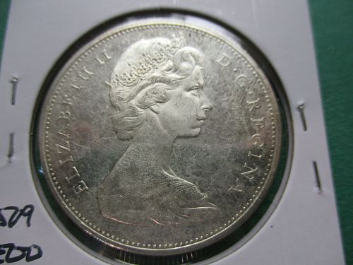 1965  Canadian 80% Silver Dollar.  Item: FO CAN65-02.