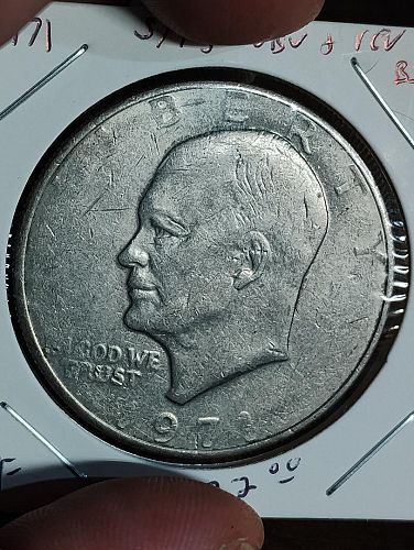 1971 EISENHOWER DOLLAR VERY FINE STRUCK THROUGH GREASE OBVERSE & REVERSE ERROR COIN