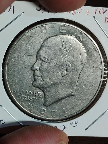 1971 EISENHOWER DOLLAR VERY FINE STRUCK THROUGH GREASE OBVERSE & REVERSE ERROR COIN