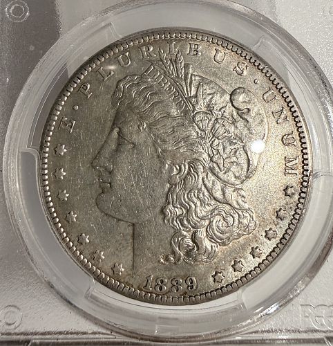 1889-CC Morgan Silver Dollar, AU50 PCGS. (13194)