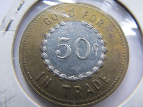 Dwight Nebraska Farmers Merchantile Company/ Good For/ 50 Cents /In trade Token