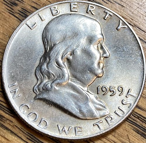 1959 Franklin half in ALMOST UNCIRCULATED condition