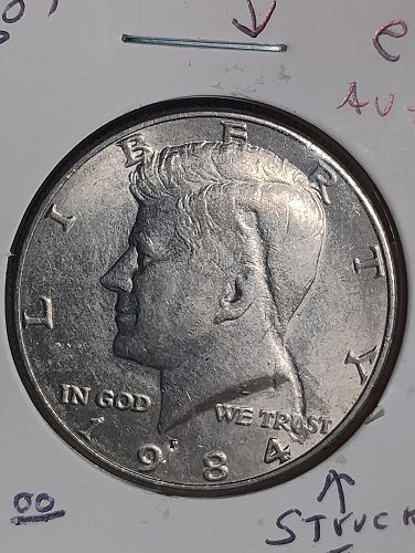 1984-P KENNEDY HALF DOLLAR STRUCK THROUGH STRING / TWINE AU-58