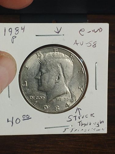 1984-P KENNEDY HALF DOLLAR STRUCK THROUGH STRING / TWINE AU-58