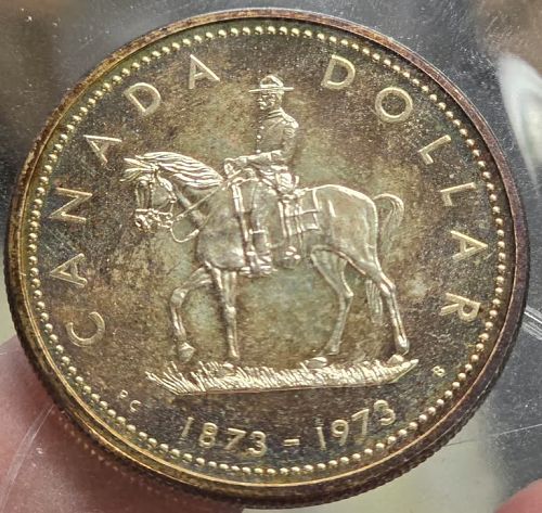 1973 Canada Silver Dollar Coin RAINBOW TONED RCMP Mountie - Superb Gem BEAUTY!