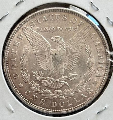 1889 P Morgan Silver Dollar. AU 50 Nice toning and cartwheel luster. M 21