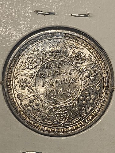 1944 silver half rupee from India
