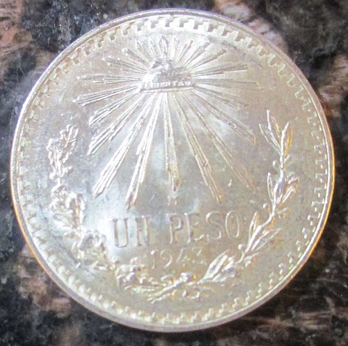 1943 Mexican Silver 1 Peso Silver Cap and Ray **BRILLIANT UNCIRCULATED*