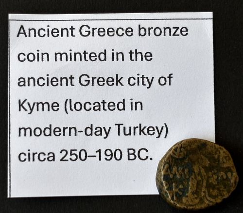 Ancient Greek bronze coin minted in kyme (250-190 BC)