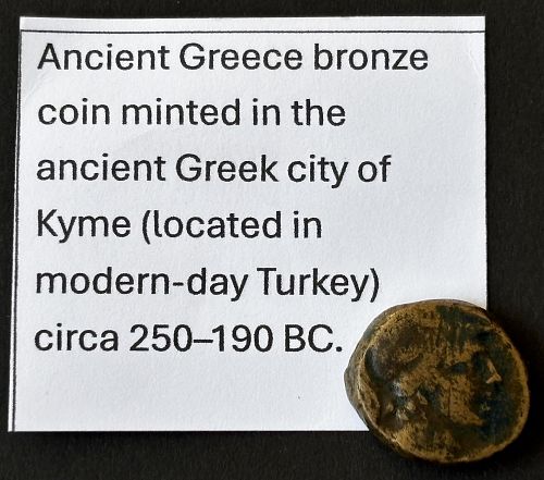 Ancient Greek bronze coin minted in kyme (250-190 BC)