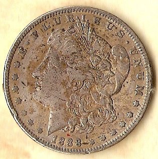 1888 P Morgan Silver Dollar a bit discolored obverse but fine detail & tail feat