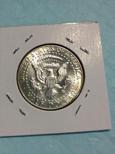 1965 Kennedy Half Dollar item-10 toned uncirculated MS+ 40% silver